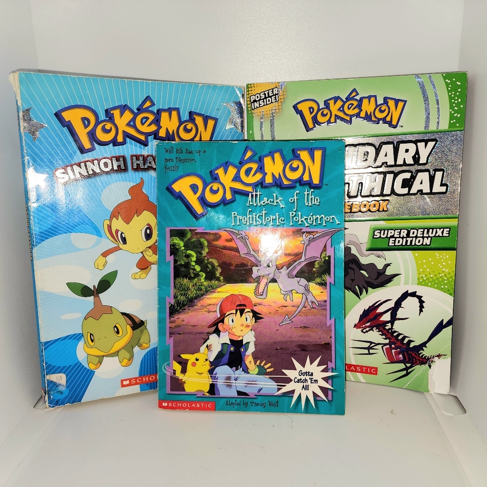 assorted lot of Pokemon books Sinnoh Handbook, Legendary and Mythical, and more